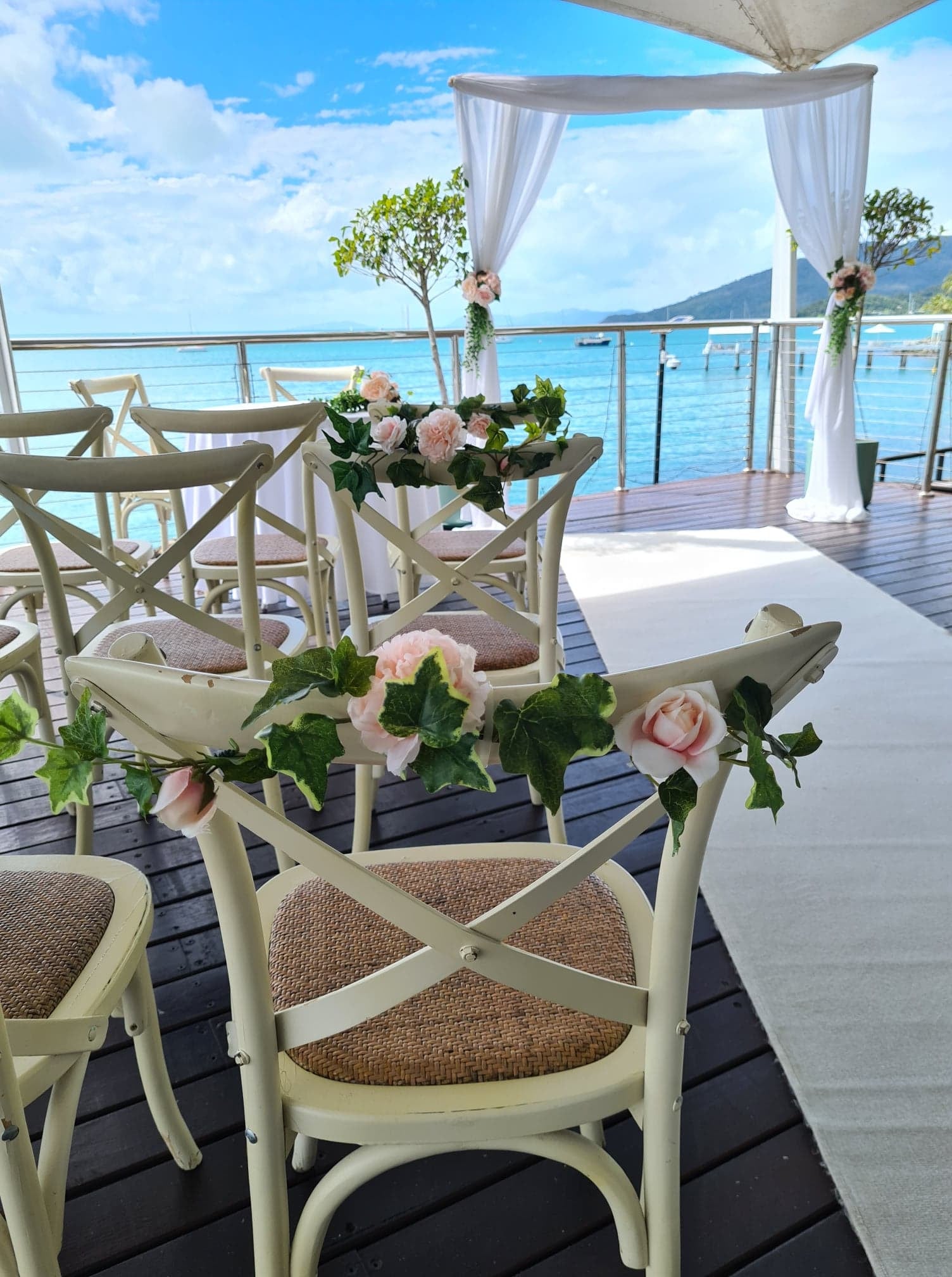 bride and groom kissing at wedding ceremony